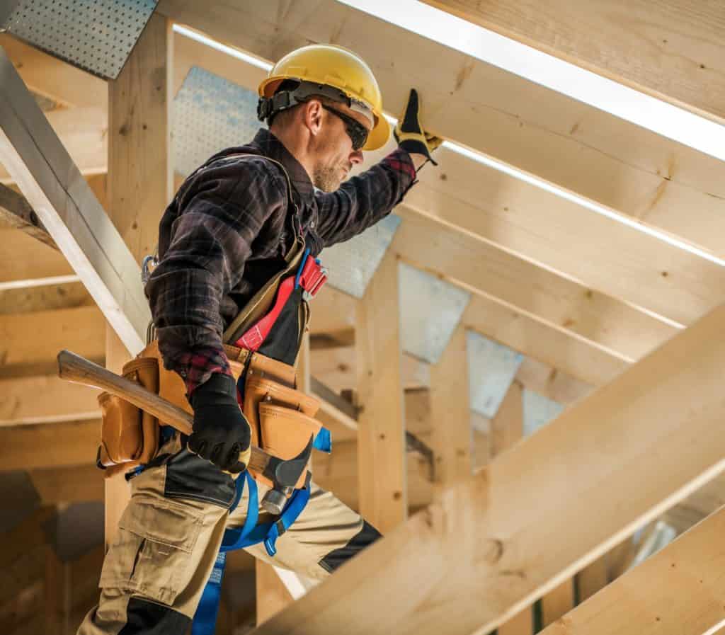 Man working on house