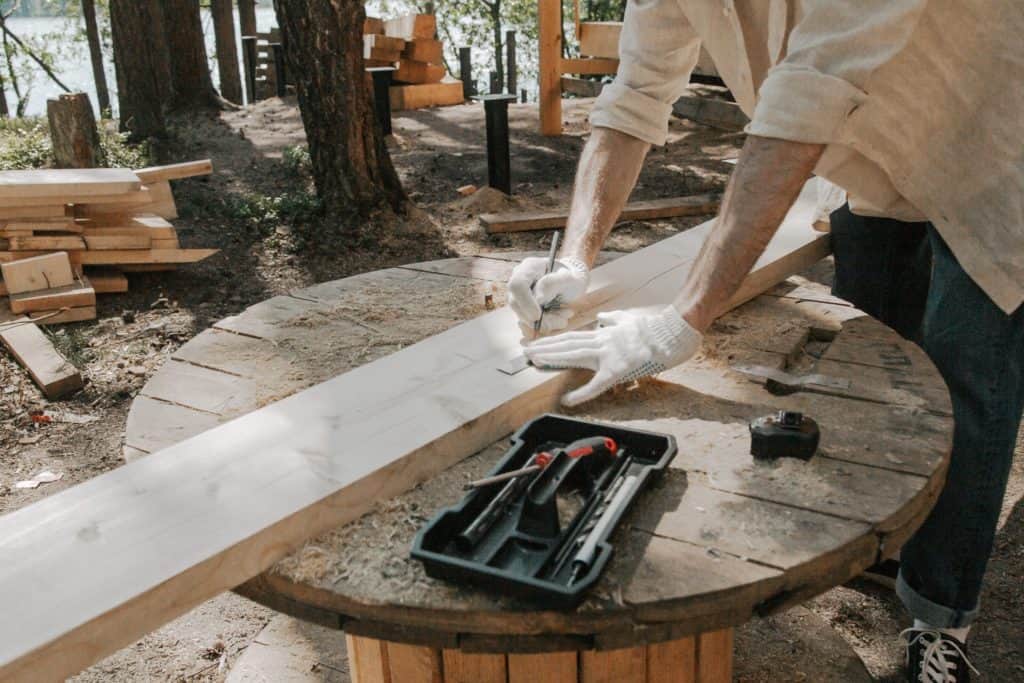 Man measuring lumber